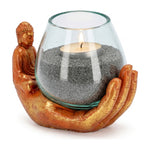 Teelichthalter Buddha Hand in Orange-Gold mit brennendem Teelicht im mundgeblasenen recycelten Glas